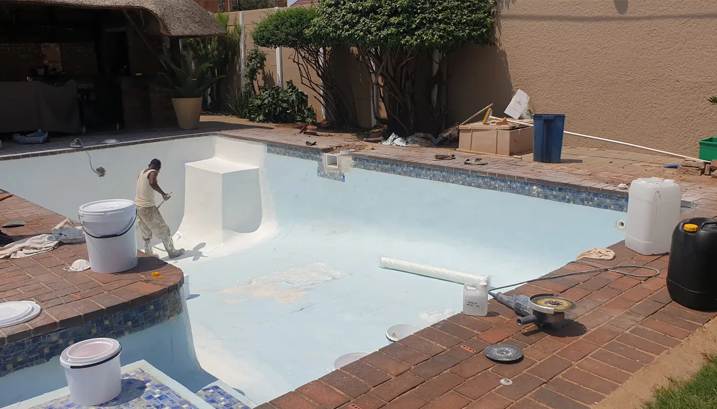 Fibreglass swimming pool before professional relining and resurfacing