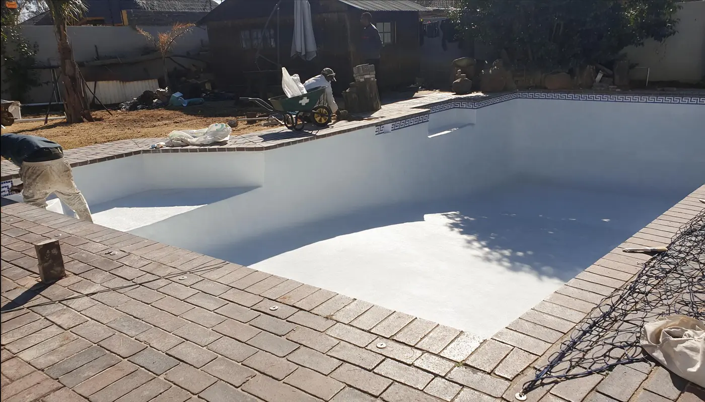 New Marbelite pool surface being applied
