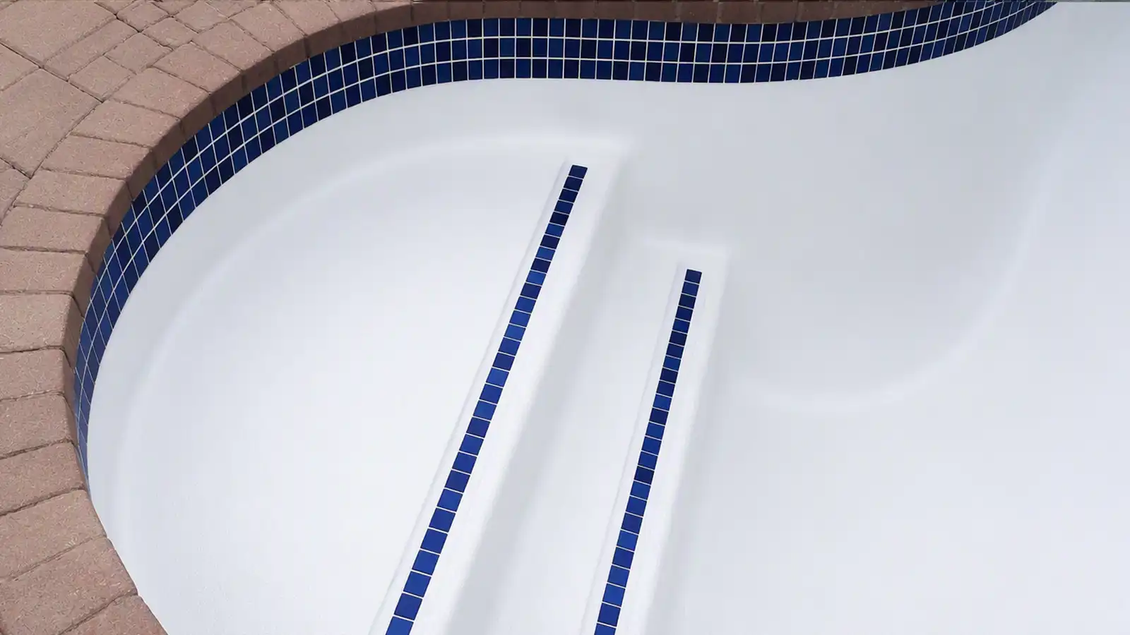 Swimming pool steps after professional pool renovation