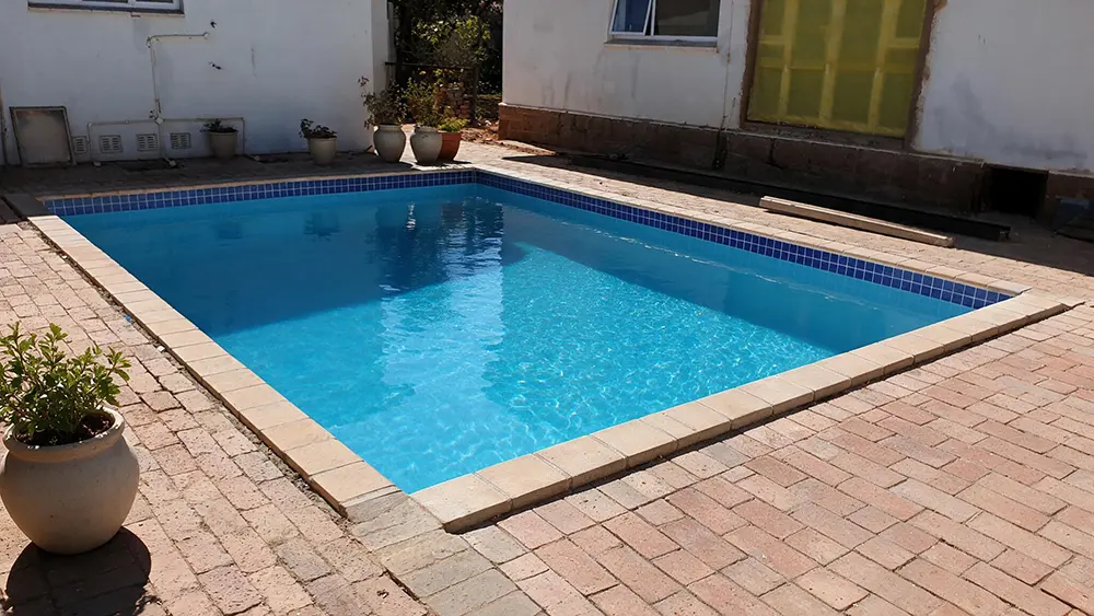The completed swimming pool after being resized, remodelled and renovated.