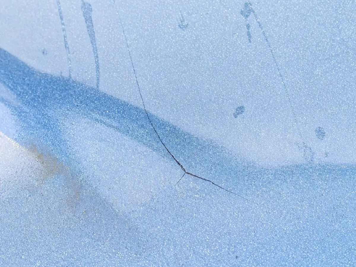 Spider cracks in a fibreglass pool gelcoat