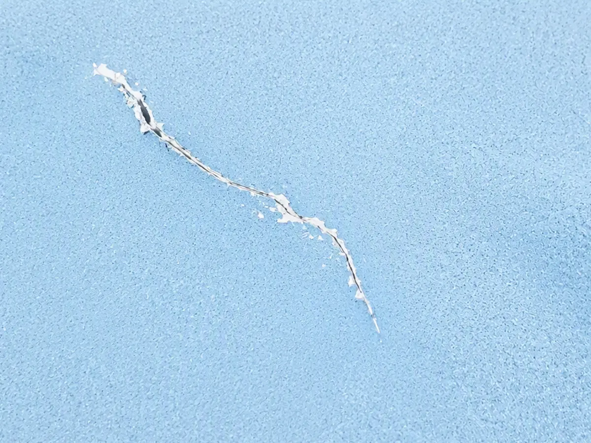 Structural crack in a fibreglass swimming pool